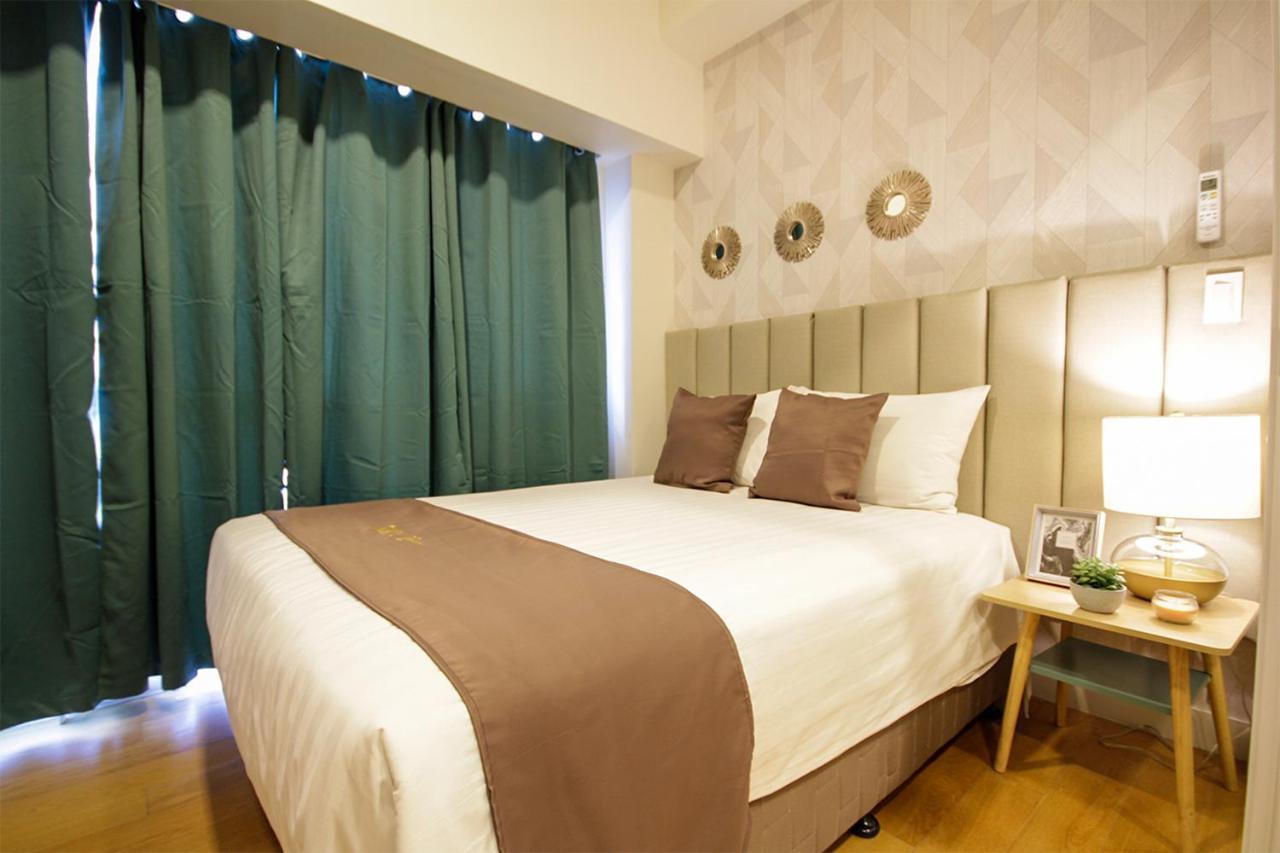 Siglo Suites @ The Acqua Private Residences Mandaluyong Buitenkant foto